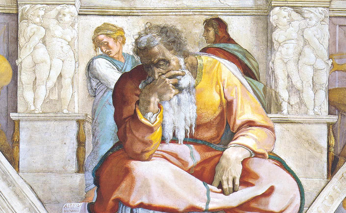 Jeremiah, as depicted by Michelangelo on the Sistine Chapel ceiling. An old man wearing robes of orange and yellow, with a long white beard and sweeping gray and white hair. His hand is over his mouth as he looks downward with a forlorn expression. Sculpted columns with cherubs appear in the background, with two women carrying similarly sad expressions.