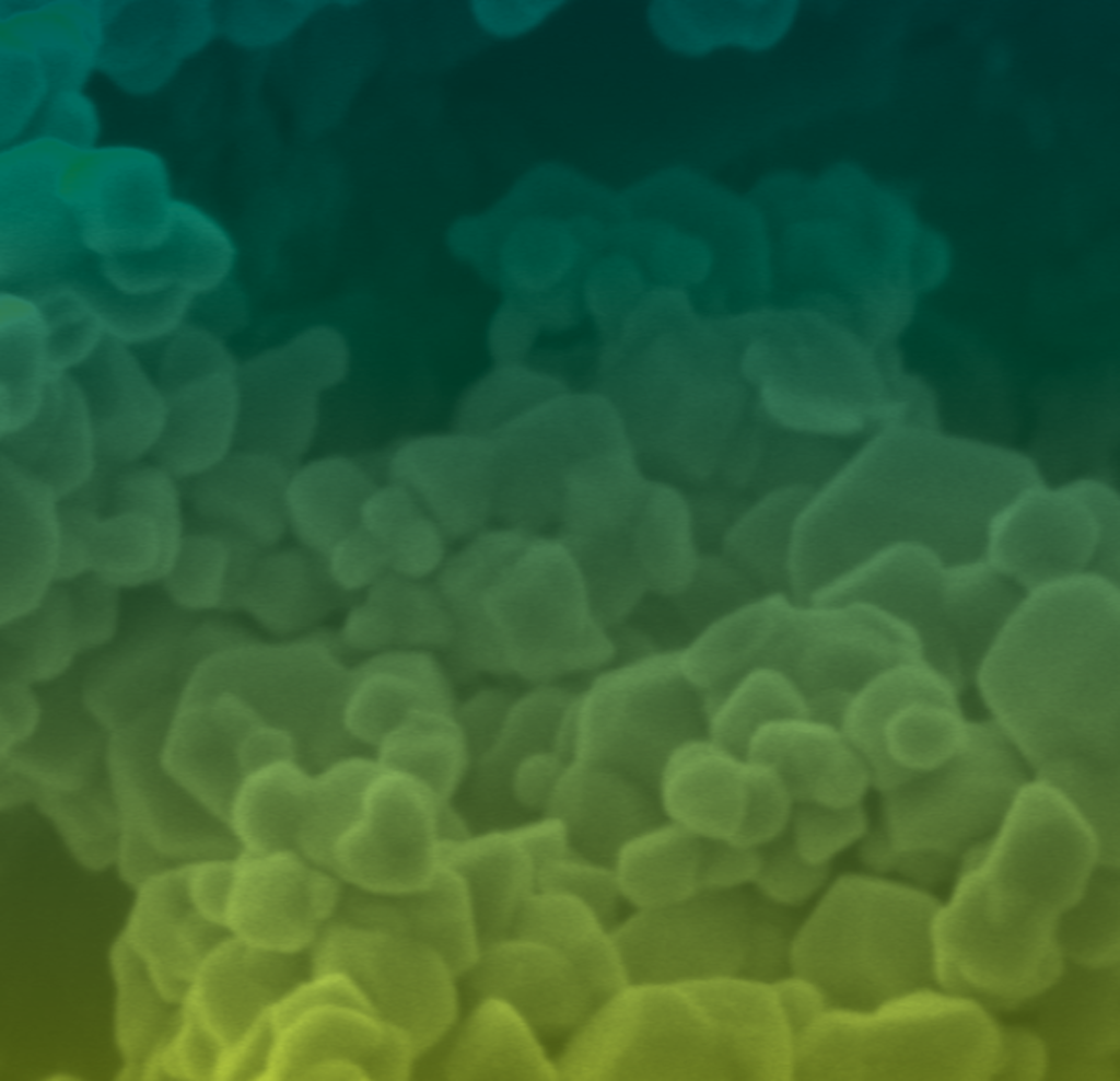 Thermoelectric nanoparticles. Nanoscale, irregular shaped globules with a dark green to light green overlay.