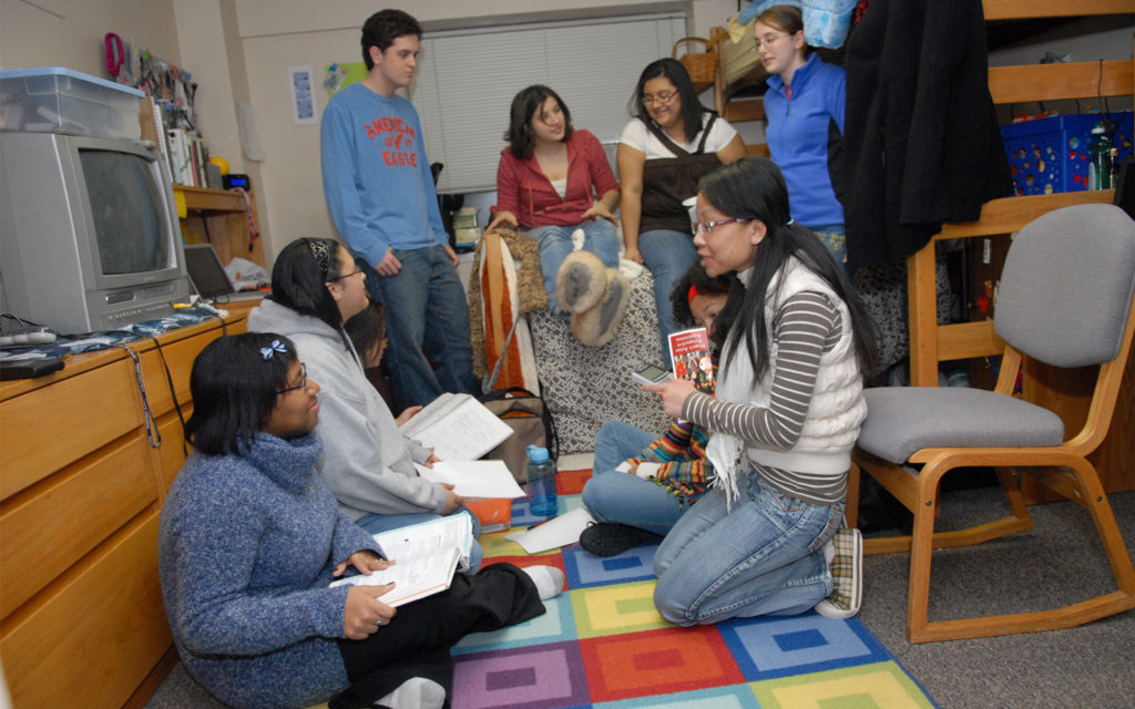 Students gather in a dorm room of Scott Hall