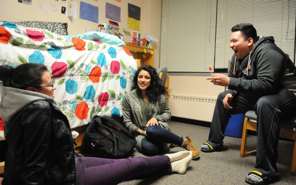Students gather in a dorm room of Scott Hall